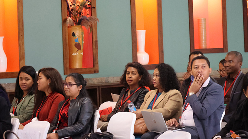 Participants at the closing ceremony of the APRECIT project. People are sitting on a chairs.